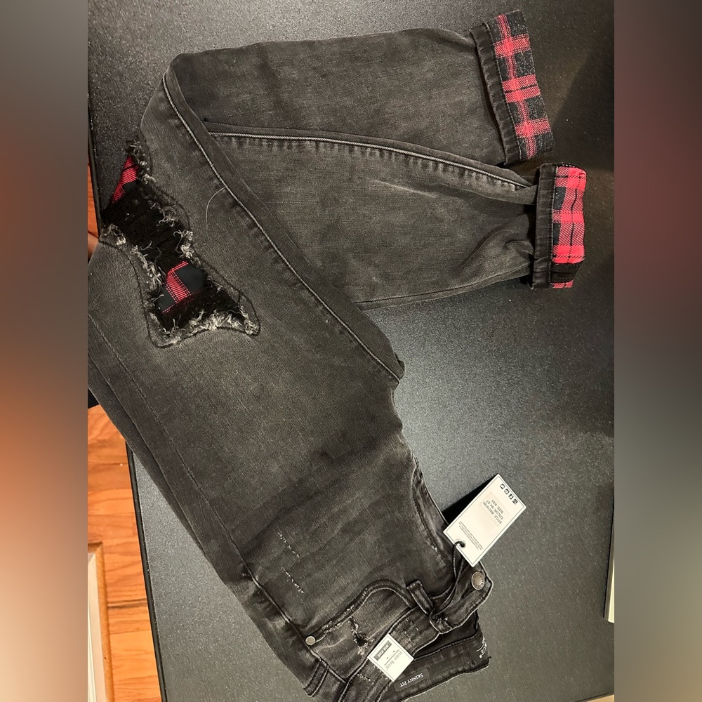 BNWT Judy Blue black jeans with red buffalo plaid patches.